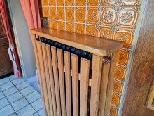 verkleideter Heizk�rper aus Gusseisen Bungalow mit Doppelgarage, Keller und pflegeleichtem Garten in ruhiger Lage von Linnich Welz